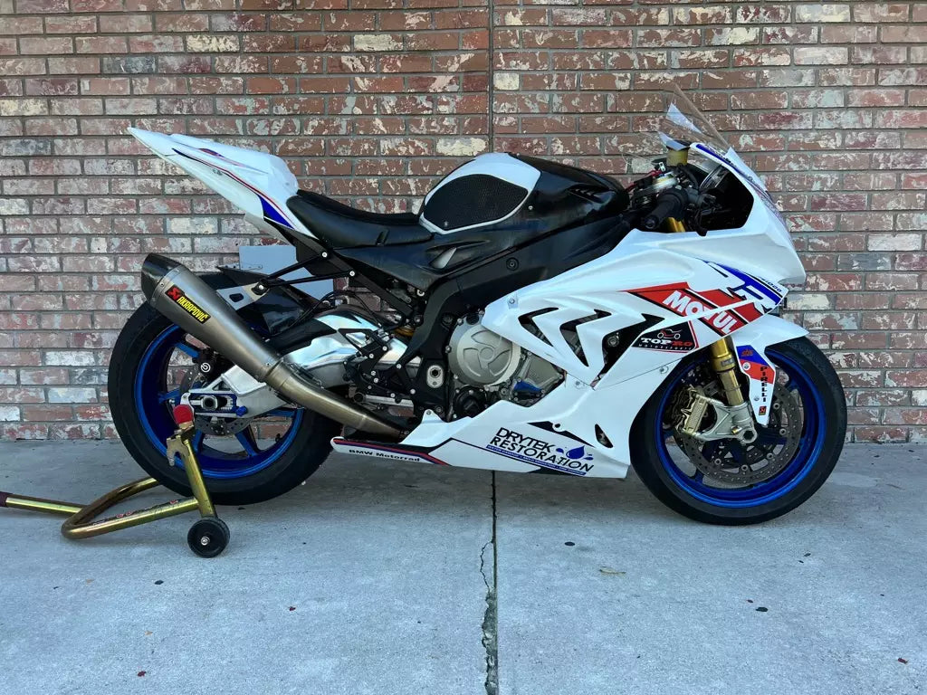 Motorcycle rider preparing bike for Florida track day