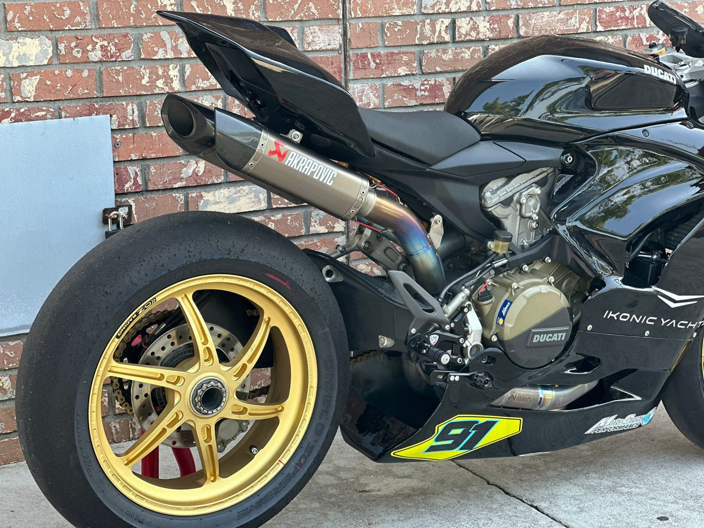 Group of motorcycles lined up at Broward County racetrack