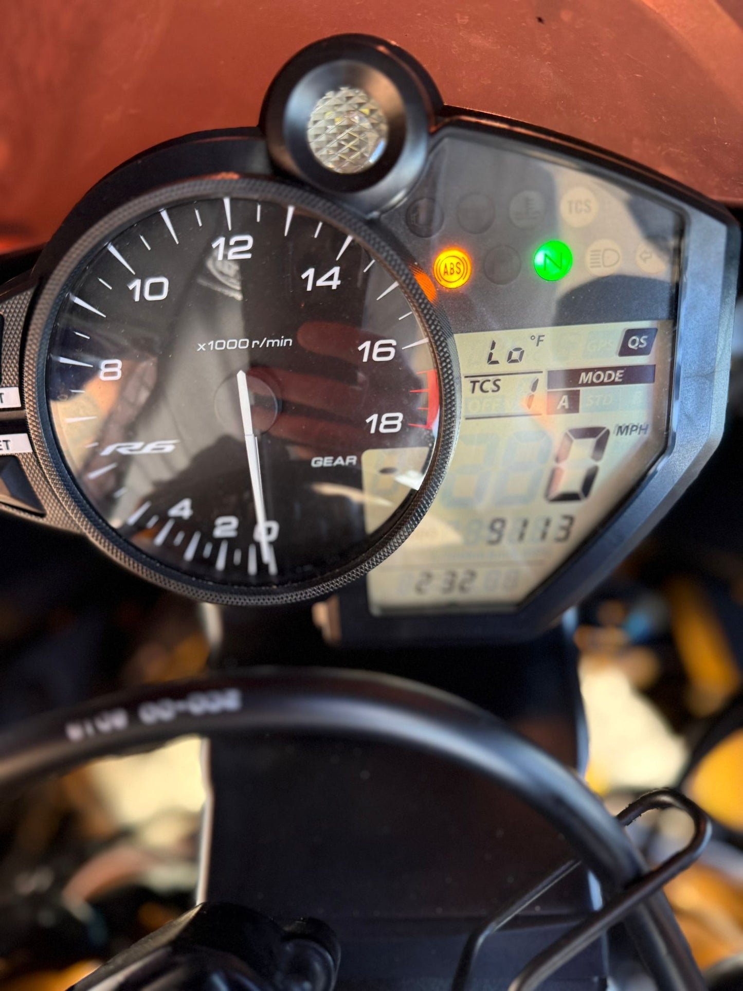 Motorcycle rider using Bluetooth system in Sunrise, FL