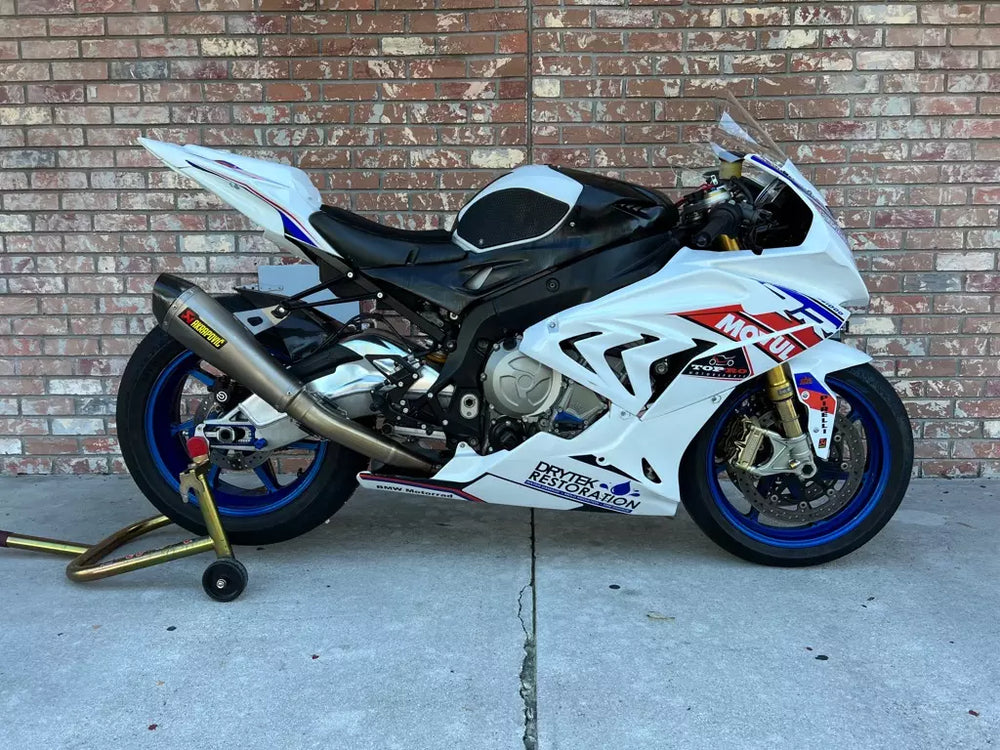 Motorcycle rider preparing bike for Florida track day