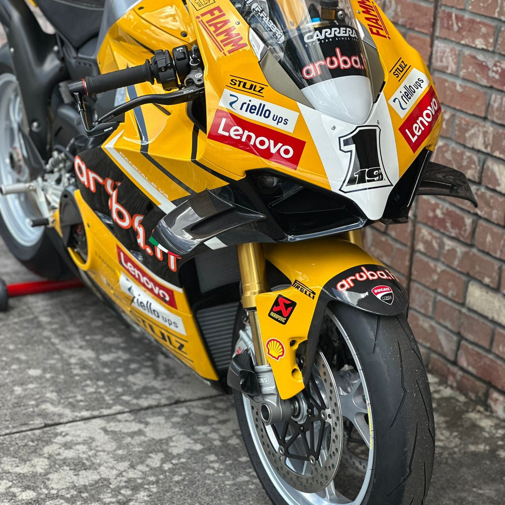 Sport bike on stands during a track day prep session