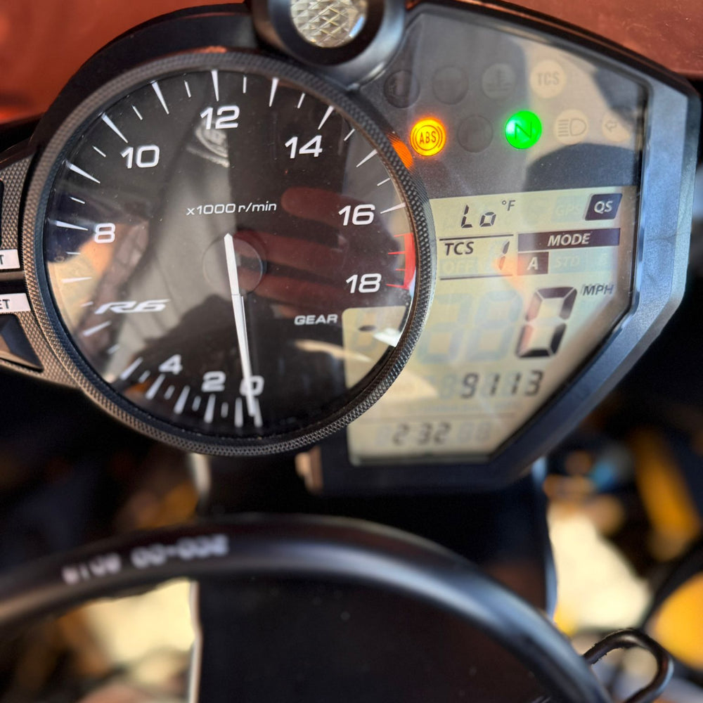 Motorcycle rider using Bluetooth system in Sunrise, FL