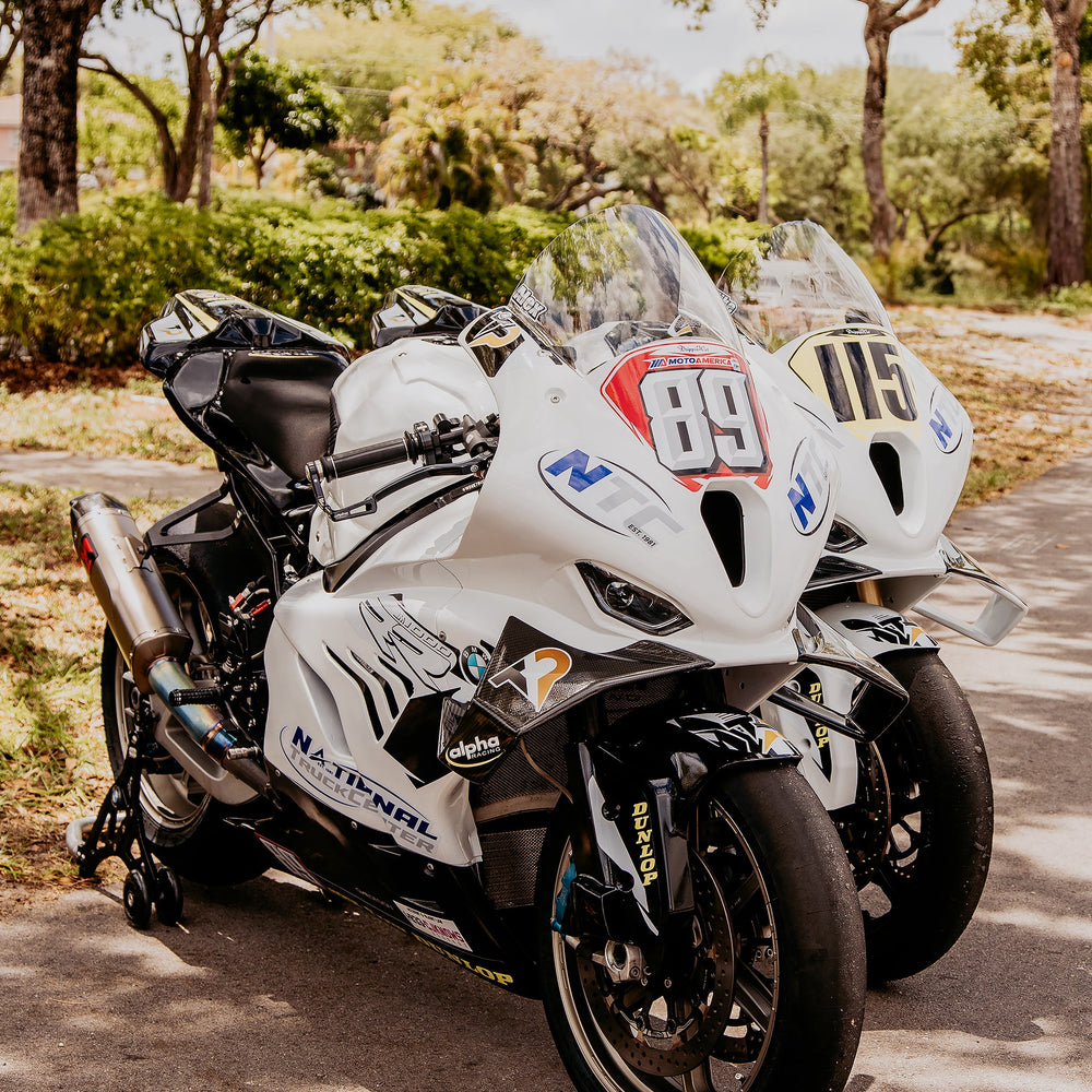Technician tuning a sportbike at Top Pro Motorsports in Coral Springs, near Sunrise Florida